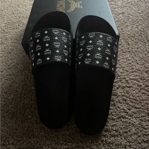 MCM Black Slides with Iconic Logo Design